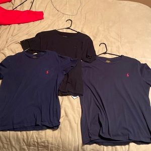 Polo pocket tee: size M, Black Champion tee: size L, Polo shirt: size youth XL